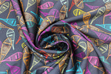 Swirled swatch Argentiere fabric (dark grey fabric with tossed snow shoe rackets allover in various colours)