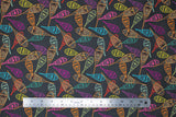 Flat swatch Argentiere fabric (dark grey fabric with tossed snow shoe rackets allover in various colours)