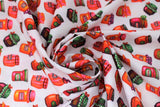 Swirled swatch Confitures fabric (white fabric with small tossed illustrative jam jars allover in various styles/flavours)