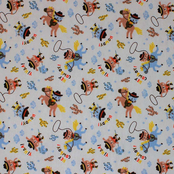Square swatch Howdy fabric (off white fabric with tossed cartoon cat and dog cowboys on blue horses and hobby horses with tossed cacti in yellow, blue and brown shades and lassos, 