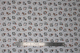 Flat swatch cozy penguin toss fabric (white fabric with small tossed black and grey cartoon penguins wearing assorted winter wear in grey, orange, forest green colourway with sweater look print within, tiny tossed trees and stars)
