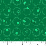Square swatch Shamrocks fabric (green fabric with ticked line circles allover with green and outlined green shamrocks tossed)