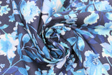 Swirled swatch blue floral printed fabric in floral watercolour (light and dark blue floral on navy)