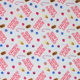 Square swatch Candy Land fabric (white fabric with tossed "Candy Land" text in candy cane letters, tossed treats candy canes, fudgesicles, vanilla ice cream cones, candies in blue, pink, red)