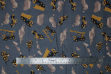 Flat swatch cartoon construction vehicles printed fabric in grey (dark grey/blue fabric with tossed yellow construction vehicles: diggers, trucks, etc. and grey rocks tossed)