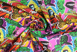 Swirled swatch Halloween Monster Pop Collage fabric (brightly coloured stickers look fabric with tossed illustrative monsters in full colour allover 'dracula, the mummy' etc with white outlines and text in various colours)