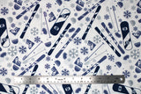Flat swatch snow sports fabric in blue (white fabric with tossed snow sports emblems in blue colour: skis, snowboards, goggles, hats, snowflakes, poles, boots)