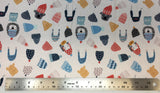 Flat swatch cartoon touques and animal heads printed fabric in neutral (off white fabric with tossed cartoon toque winter hats in various colours and designs, and tossed cartoon/drawn animal heads koala, zebra, lion)