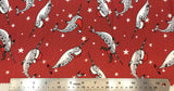 Flat swatch santa hat cartoon narwhals printed fabric in red (medium/deep red fabric with tossed cartoon grey narwhals with red santa hats and candy cane look tusk and tossed white stars)