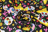 Swirled swatch Skull Sombrero Black fabric (black fabric with tossed brightly coloured sugar skull heads, some in sombreros with tossed floral and maracas in various colours)