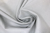 Swirled swatch Silver Graph Metallic fabric (off white fabric with thin grey grid lines allover and occasional silver metallic effect stripes)