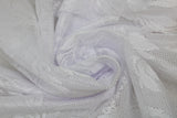 Swirled swatch Damask Drapery Lace in white (loose mesh lace detail with floral/greenery like pattern)