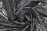 Swirled swatch black Marble Drapery Lace (tight mesh with busy floral/stem like design allover)
