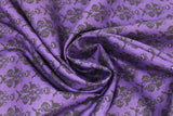 Swirled swatch Eggplant fabric (dark purple fabric with small black ornate/victorian design allover)