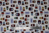Flat swatch White fabric (white fabric with full colour character trains allover in multi directions with "Thomas & Friends" logo tossed)