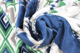 Swirled swatch denali fabric (southwest style fabric with thick stripes of geometric/diamond like pattern, thick blue stripes with white and grey moose graphics, all in white, grey, green and blue colourway)