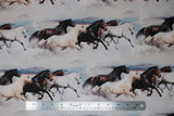 Flat swatch border style (pattern in lines) fabric with white/grey/brown/black horses galloping through white clouds with sunset sky poking through slightly