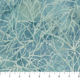 Swatch of blue branches fabric (light blue marbled fabric with lightest blue tree branch shapes all over and a dyed look to the fabric)