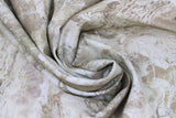 Swirled swatch trees fabric - off white/cream marbled look fabric with pale brown tree shape silhouettes and texture