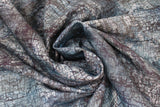 Swirled swatch blue elephant texture fabric (pale dark blue/black marbled look fabric with cracked elephant skin like texture allover)