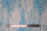 Flat swatch birds blue fabric (white/light blue marbled look fabric with subtle blue bird silhouettes allover)