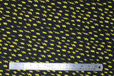 Flat swatch lightning fabric (black fabric with repeated yellow lightning bolts varying slightly in style)