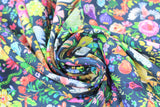 Swirled swatch garden of life fabric (dark blue fabric with brightly coloured jungle and forest plants and animals owls, bunnies, insects, tigers, monkeys etc. in bright paint look style and colours)