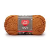 Ball of Red Heart soft yarn in tangerine (medium pale orange)