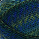 Swatch of Red Heart Gemstone yarn in shade emerald (medium to dark faded blues, medium to dark faded greens colourway with twists)