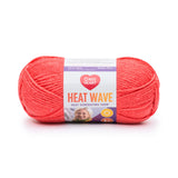 Ball of Red Heart Heat Wave yarn in shade beach ball (coral)
