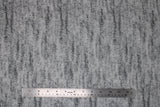 Flat swatch light grey knit fabric (light grey knit look fabric with subtle black accents)