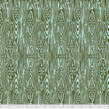Flat swatch Yule Log Green fabric (green and pale blue coloured fabric creating inner log texture with palest green/blue snowflakes inside)