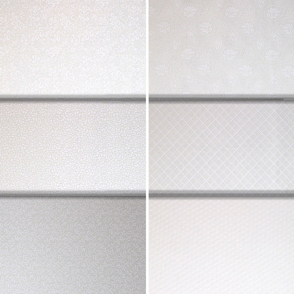 Group swatch cotton clouds fabric collection (white/off white fabrics with small faint prints in various styles)