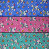 Group swatch unicorns & donuts themed fabrics in various colours