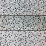 Group swatch narwhal printed fabric in various colours