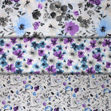 Group swatch fabric bolts in various floral patterns/styles