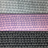 Group swatch cursive writing bla bla bla fabric in various colours