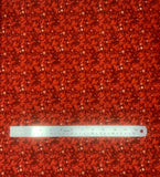 Bitter Berry fabric swatch (dark red fabric with busy tossed red leaves allover and white/red dots tossed)