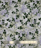 Lilac fabric swatch (white fabric with tossed white lilac floral and green leaves with subtle purple/lilac coloured silhouettes)