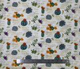 Flat swatch Tossed Succulents fabric (white and pale green subtle marbled look fabric with tossed green cacti allover with floral accents and text "Catch your dreams" "Dreams do come true" etc)
