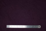 Flat swatch Mirabella knit fabric in plum (dark purple red)