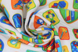 Swirled swatch comfy print flannel in kid's tool box (multi-coloured cartoon patches with tools and vehicles on white)