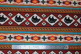 Flat swatch Terracotta Bears fabric (horizontal striped southwest style fabric with geometric shapes and bear silhouettes/paws allover in red, orange, teal and natural shades)