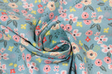 Swirled swatch Light Blue fabric (pale turquoise blue green fabric with busy tossed illustrative style floral and greenery allover in white, yellow, pink, green)