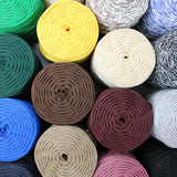 Group swatch assorted macrame cord rolls in various colours