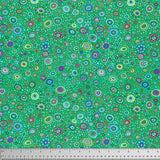 Swatch of multi-coloured Roman glass printed fabric in emerald