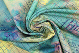 Swirled swatch moss fabric (medium to dark greens marbled fabric with black grid lines and cursive allover)
