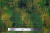 Flat swatch moss fabric (medium to dark greens marbled fabric with black grid lines and cursive allover)