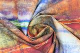 Swirled swatch Dyed Stripe fabric (multi-tonal marbled look fabric with subtle dyed stripe look, black text and lines, and subtle black floral/leaf design: green, blue, orange, rust colourway)