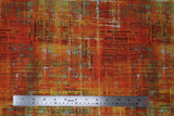 Flat swatch Scraped Layers fabric (orange, yellow, green, rust distressed style fabric with white and yellow cross hatch/scratch look marks, subtle black text)